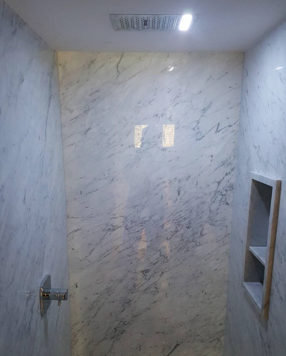 marble slab boulder panel ensuite shower