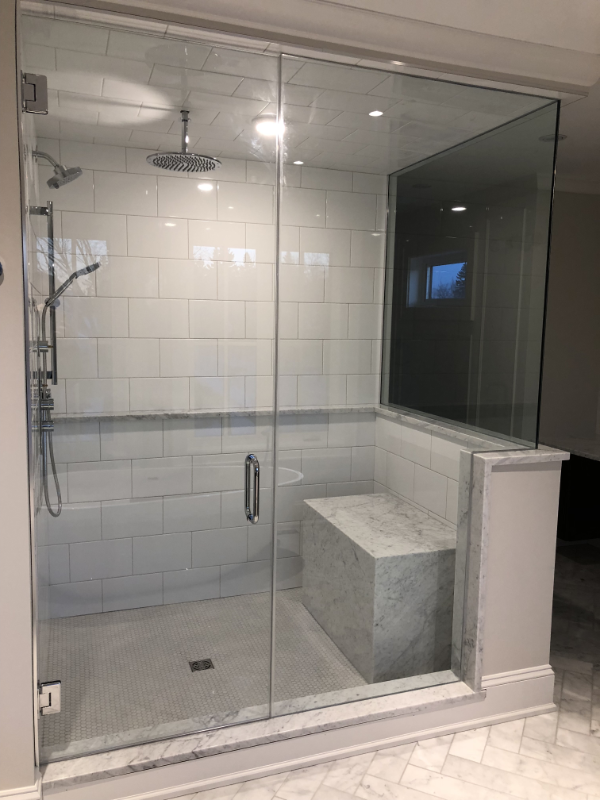 Custom Shower Design with standalone bench, niche ledge, and rainfall handheld options