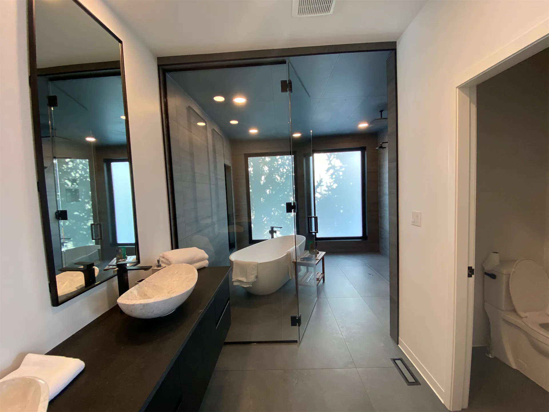 Tile Installation Project of a whole house completed in Strathcona County with 24x48 tile. IT was a collaboration of a few of our tile contractors