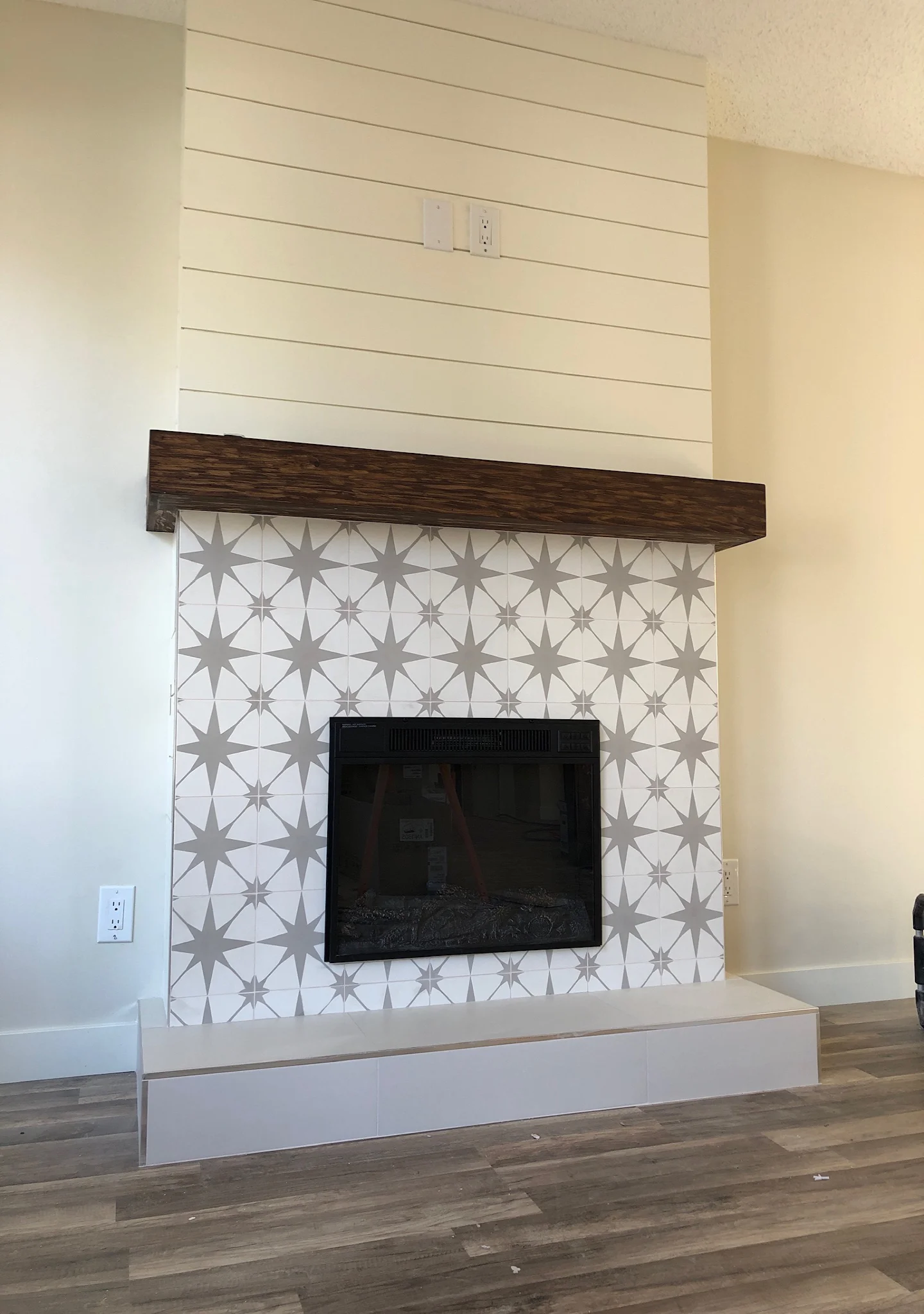 8x8 art deco tile from tile and stone source in master bedroom fireplace
