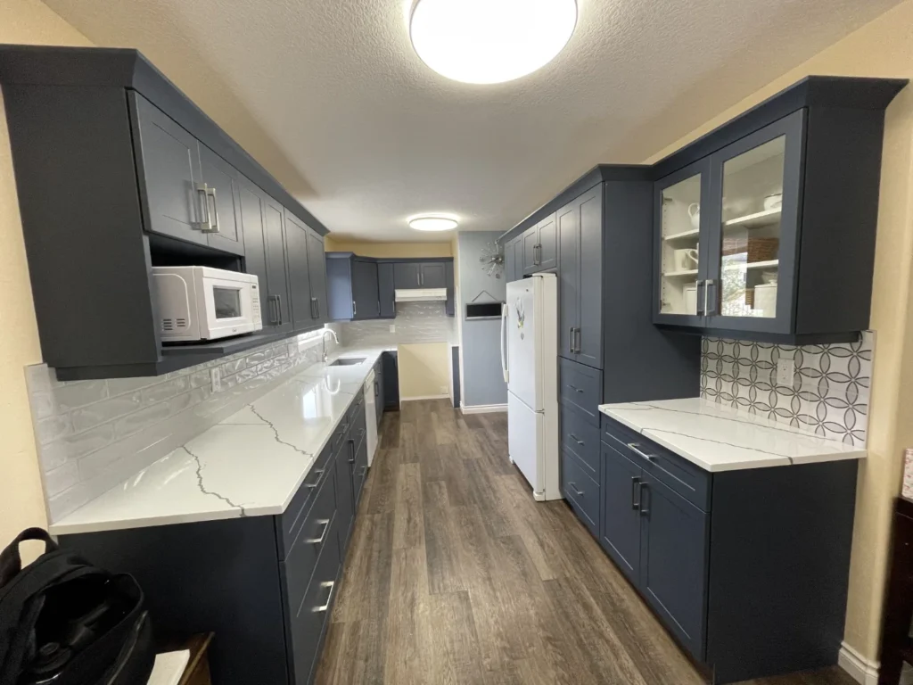 4 by 12 subway and 8x8 art deco tile installed in new kitchen cabinets & counter